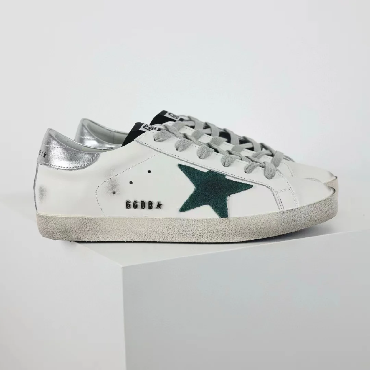 GG 'Ball-Star Green Star Silver Heel Tab'